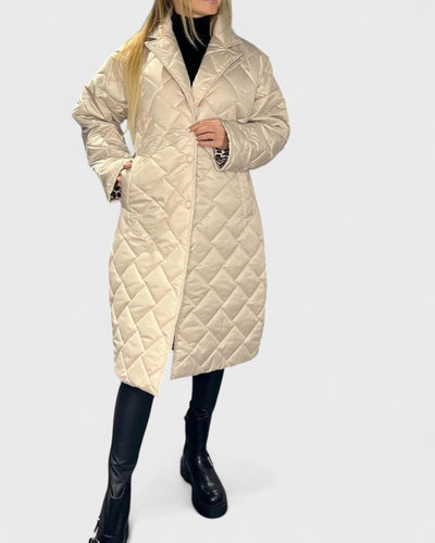 Габриела - Дълго капитонирано яке с модерен силует